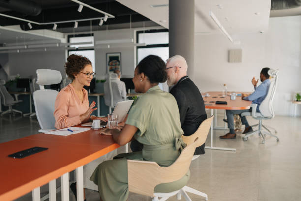 istock Collaborative business meeting in modern office space. 2184925045