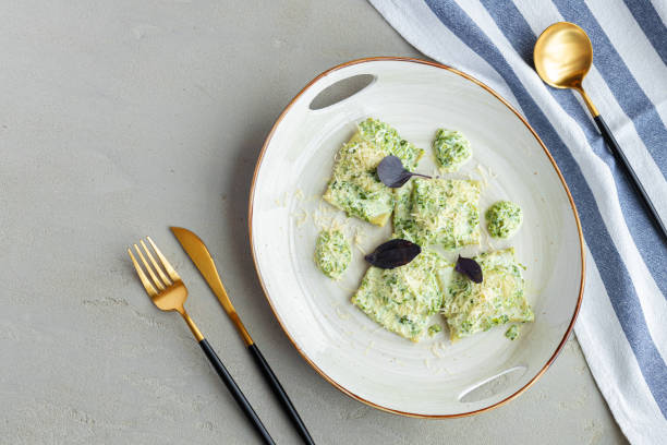 istock Russian dumpling served with parsley and cheese on plate 2184925814