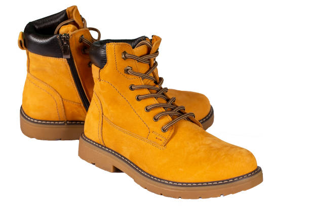istock Winter brown nubuck boots with laces and zipper on a white background 2184930785