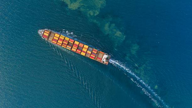 istock Aerial top view large cargo container ship at blue sea. 2184936674