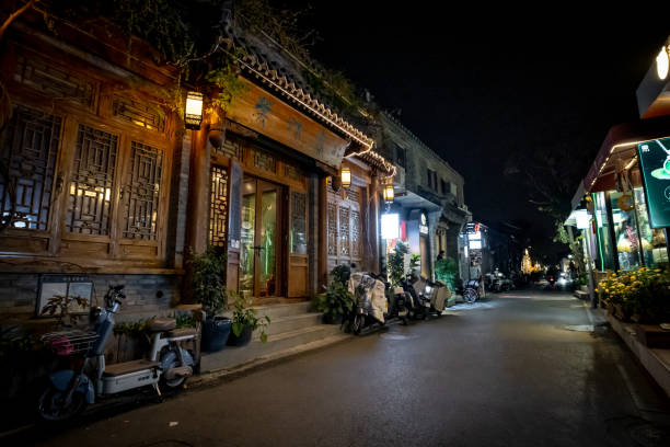 Beijing, China. 6 November 2024. People in the narrow alleys of Wudaoying Hutong in Beijing