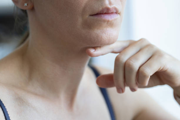 istock Woman trying to keep her head level for correct posture. 2184937509