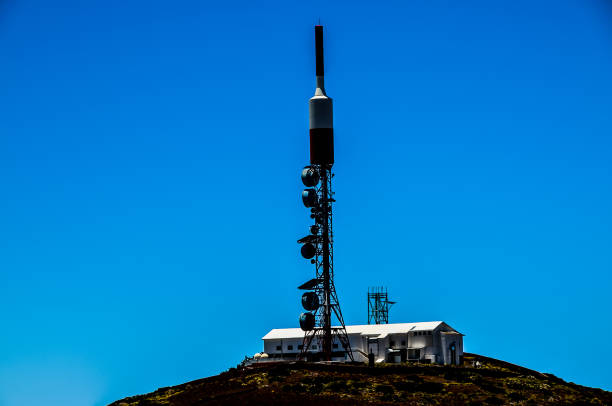 istock A tall tower with a white roof and a black top 2184938818