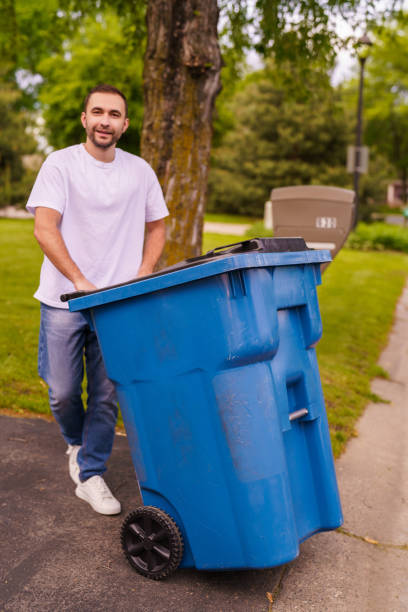 istock Caucasian Man is throwing away next to His House. 2184944700