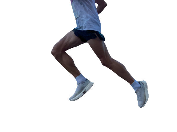 istock athlete running in shadows isolated on white background 2184945202