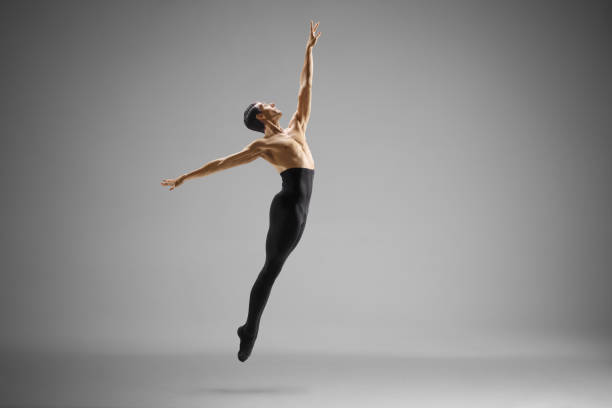 istock Male ballet dancer performing a jump 2184945331