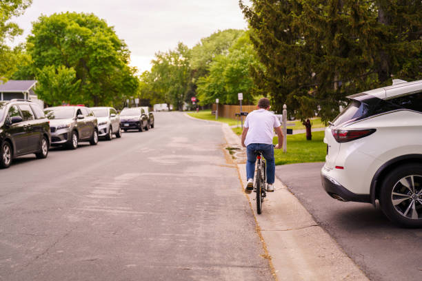 istock Young businessman commuting to work with a bicycle 2184945714