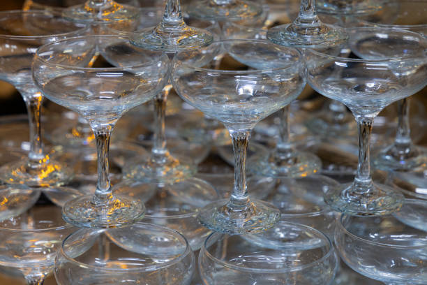 istock saucer champagne glasses tower 2184947539