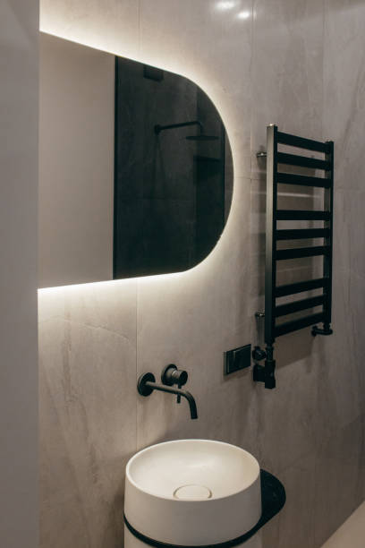 istock Interior of modern bathroom with illuminated mirror 2184949920