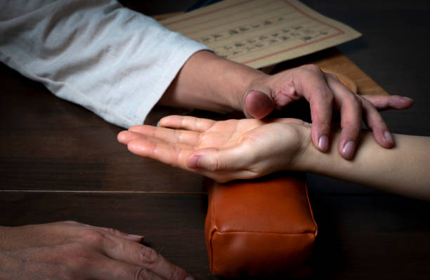 istock Traditional Chinese Medicine is diagnosing women's pulse 2184952013