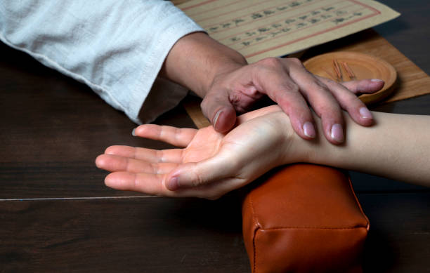 istock Traditional Chinese Medicine is diagnosing women's pulse 2184952285