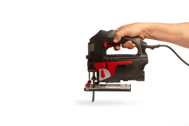 Man hand holding a jigsaw on a white background