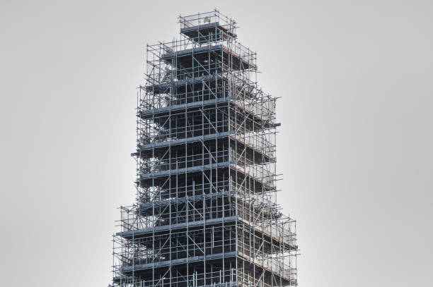 Scaffolding surrounding church steeple for restoration work UK