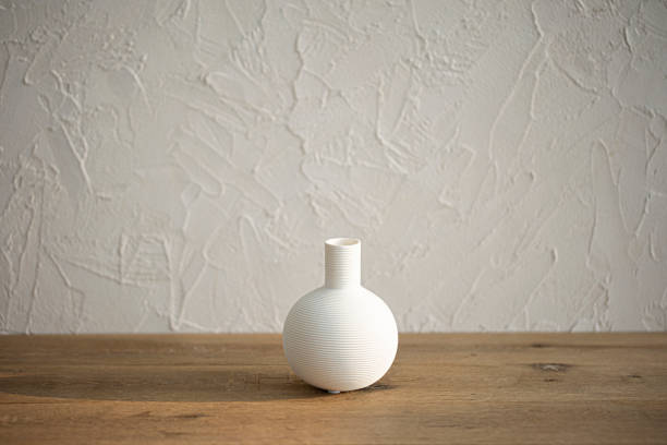 istock White Porcelain Vase On Wooden Background 2184958994