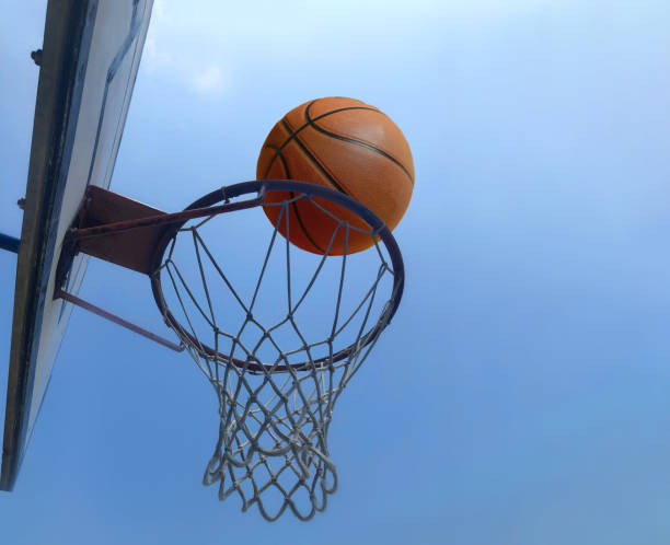 istock Basketball goal and ball 2184969157