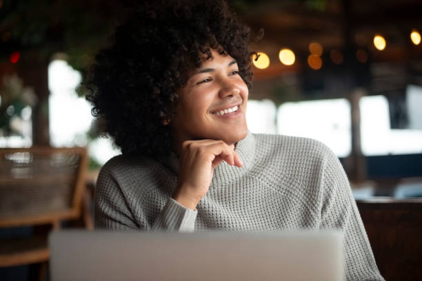 istock Laptop, smile and thinking with man in coffee shop for planning, research or study. Computer, freelance and future with happy entrepreneur person in internet cafe for small business startup ideas 2184970231