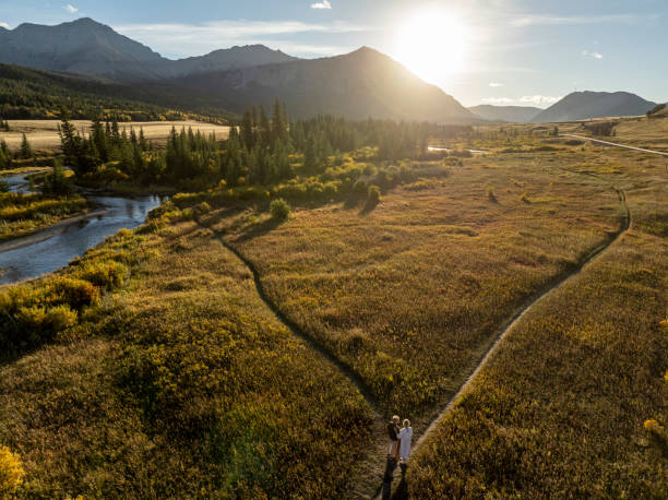 istock Aerial view of mature couple at fork in pathway 2184971598