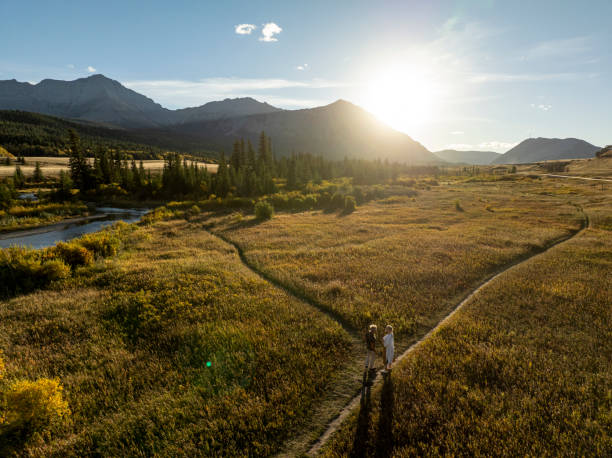 istock Aerial view of mature couple at fork in pathway 2184971635