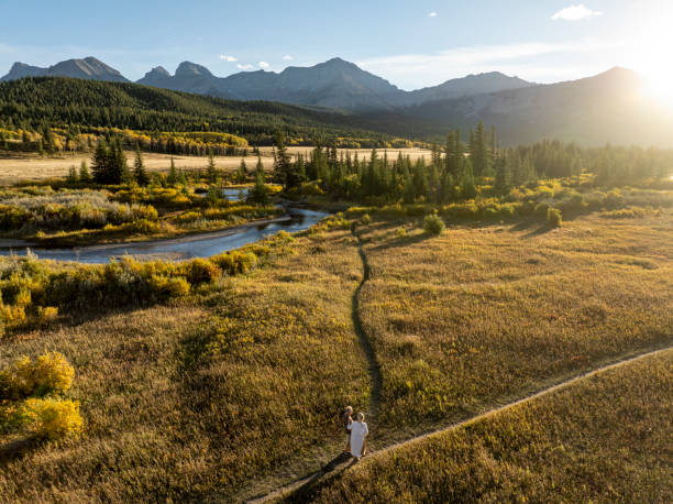 istock Aerial view of mature couple at fork in pathway 2184971647