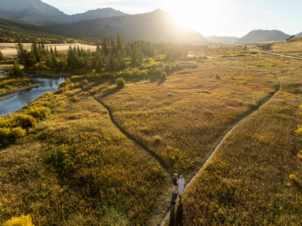 istock Aerial view of mature couple at fork in pathway 2184971658
