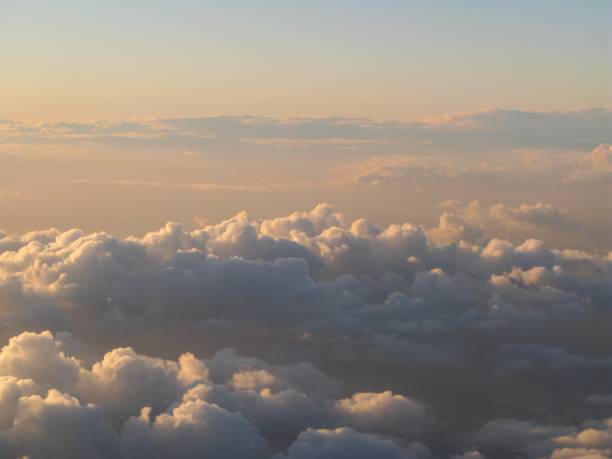 istock Beautiful and dreamy Clouds and Cloud Formations photographed from above during sunset / dawn 2184974562