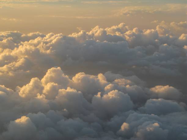 Beautiful and dreamy Clouds and Cloud Formations photographed from above during sunset / dawn Beautiful and dreamy Clouds and Cloud Formations photographed from above during sunset / dawn. wow airlines stock pictures, royalty-free photos & images