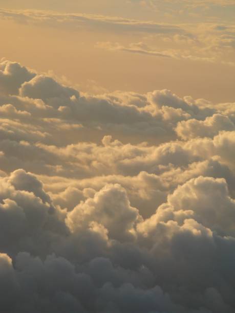 istock Beautiful and dreamy Clouds and Cloud Formations photographed from above during sunset / dawn 2184974574