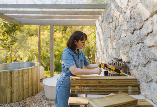 istock Woman working on a DIY project outdoors 2184976515