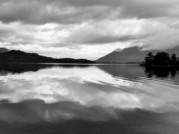 istock Clouds reflected in a lake in the Lake District National Park 2184977153