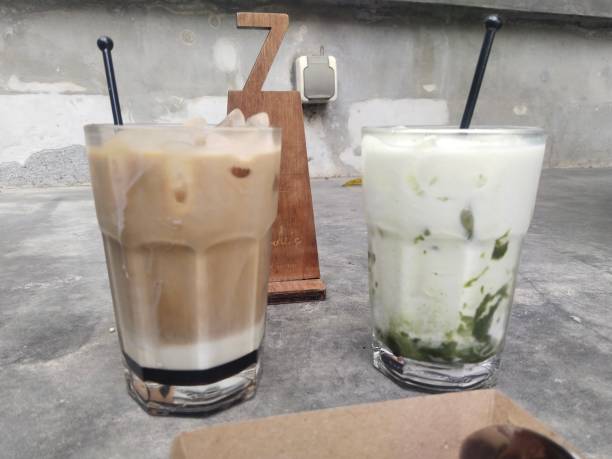 istock a glass of coffee and matcha ice 2184977275