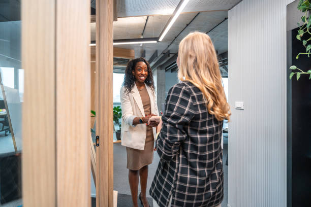 istock Professional Greeting between Diverse Businesswomen 2184978216
