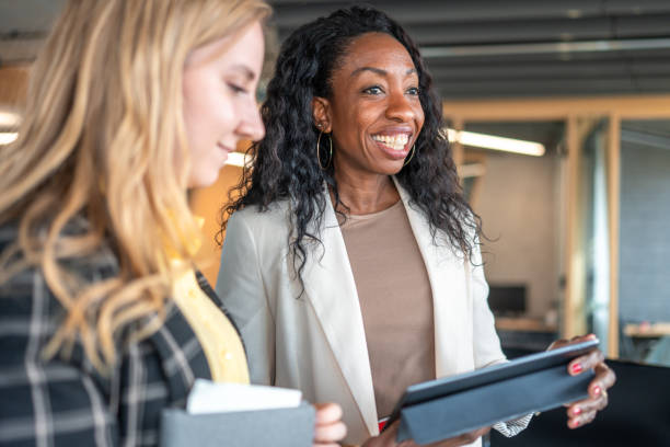 istock Diverse Financial Advisors Engage in Strategy Session 2184978300