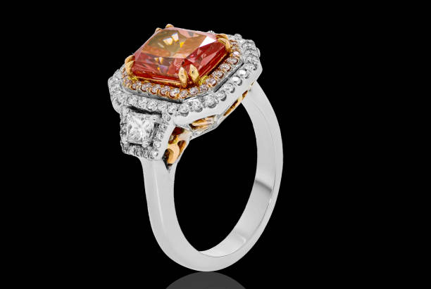 istock Elegant White and Yellow Gold Ring with Ruby Center Stone and Diamond Accents on Black Background, Luxury Jewelry with Precious Gemstones 2184978818