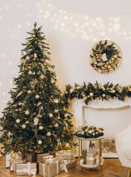 istock Christmas tree shining in decorated living room 2184979218