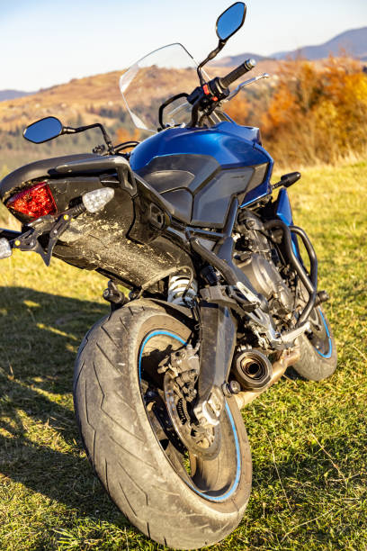 istock Sport motorcycle parked, view from the rear wheel. 2184980635