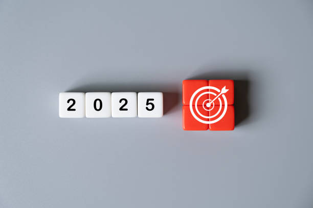 istock White cube shape with change transition from 2024 to new year 2025 with business or self improvement target and objective shot on grey background with copy space studio shot. New year resolution 2184981833