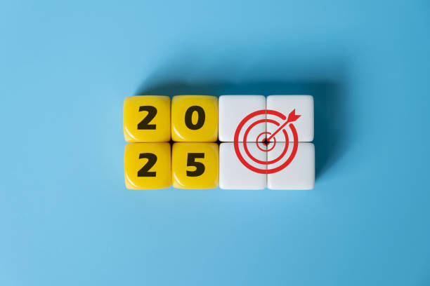 istock White cube shape with change transition from 2024 to new year 2025 with business or self improvement target and objective shot on grey background with copy space studio shot. New year resolution 2184981953
