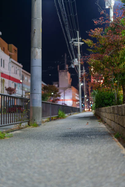 istock Back alley scenes at night when no one is around. 2184982079