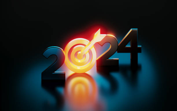Orange Target Symbol Glowing Next To 2024 On Black Background