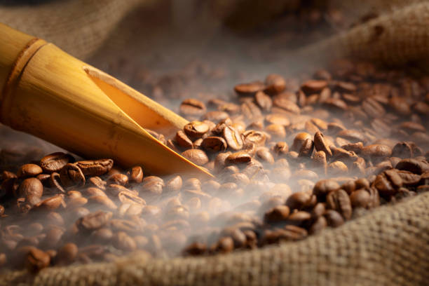 istock Fresh roasted coffee beans in burlap bag. 2184987359