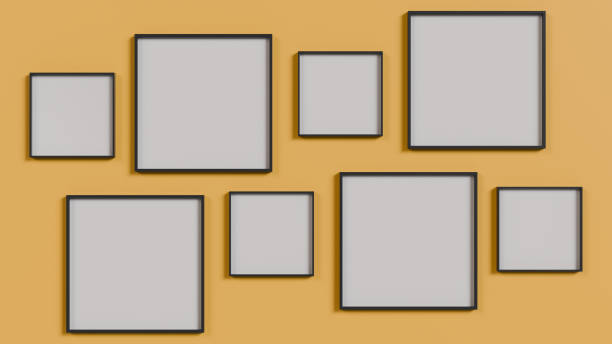 istock Minimalist arrangement of blank frames on a yellow wall 2184989459