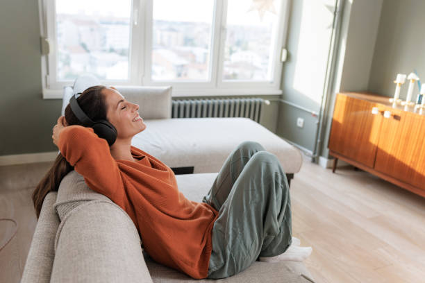 istock A smiling woman immersed in the sound 2184991543
