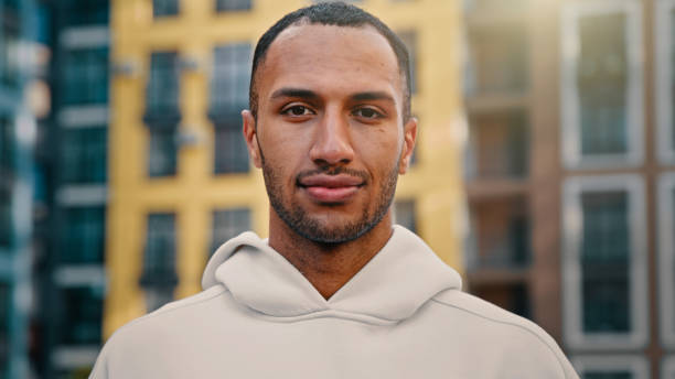 istock Portrait satisfied attractive man give positive recommendation make thumb up gesture approved symbol of good choice recommend sport and healthy lifestyle happy sportsman stand on cityscape background 2184996204
