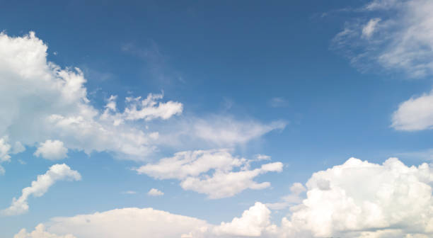 istock A beautiful sky filled with fluffy clouds on a bright day, perfect for nature lovers and photographers 2184996228