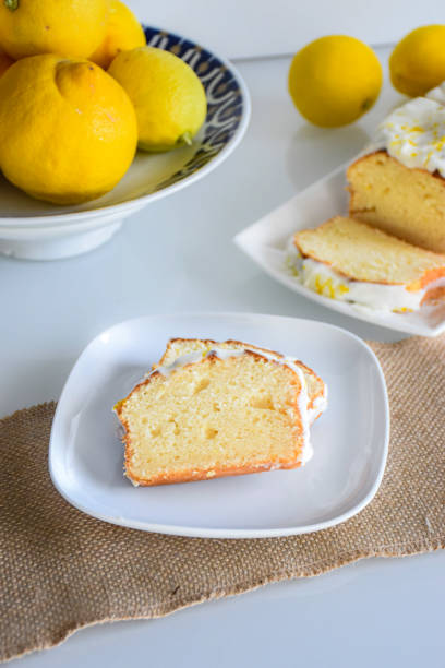 istock lemon sponge cake glazed in a kitchen with a neutral homemade background 2184997040