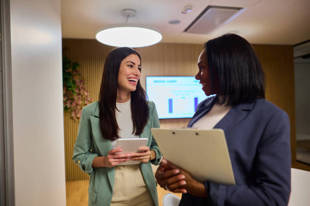 istock Professional Colleagues Collaborating On Project in Modern Office 2184997760