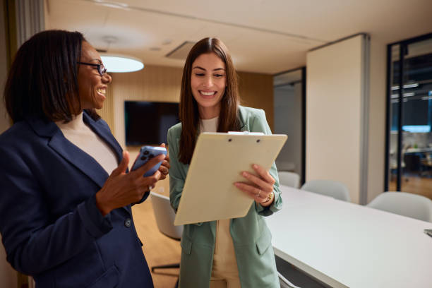 istock Professional Colleagues Collaborating On Project in Modern Office 2184998115