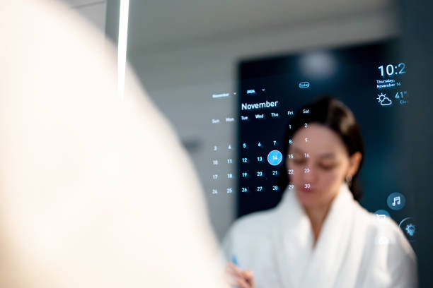 istock woman doing her morning beauty routine in front of the smart mirror 2185000067