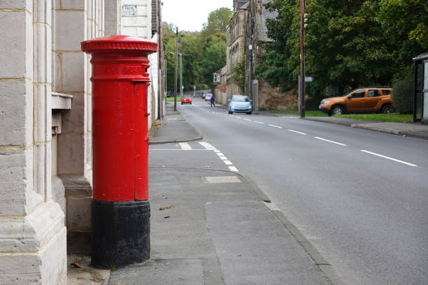 istock British mail box in the street background 2185001621