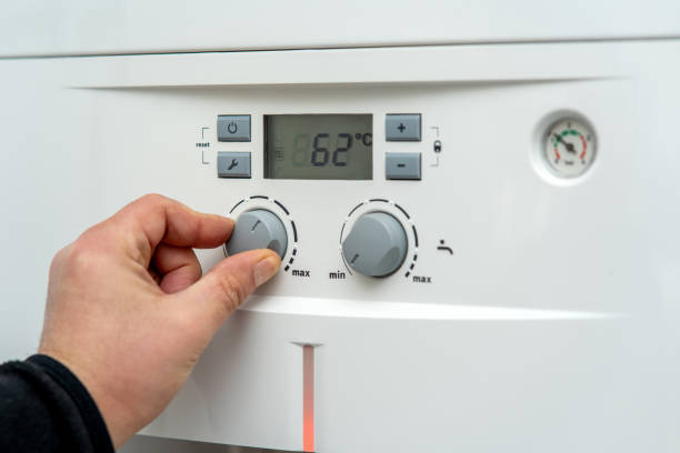 istock Temperature adjustment of gas boiler 2185004198